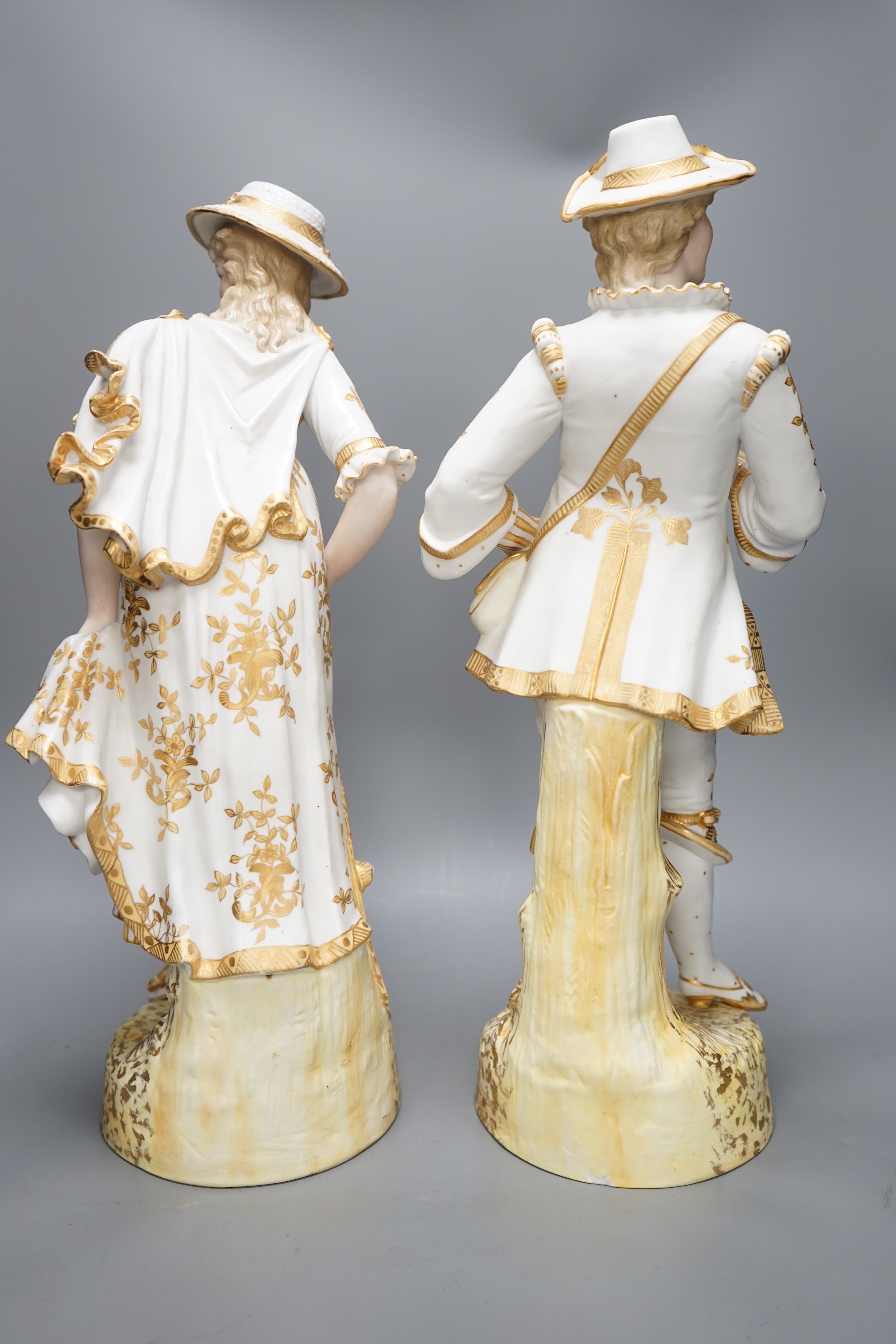 A pair of late 19th century Paris porcelain figures, tallest 50cm